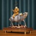 Color copper shepherd boy riding a bull